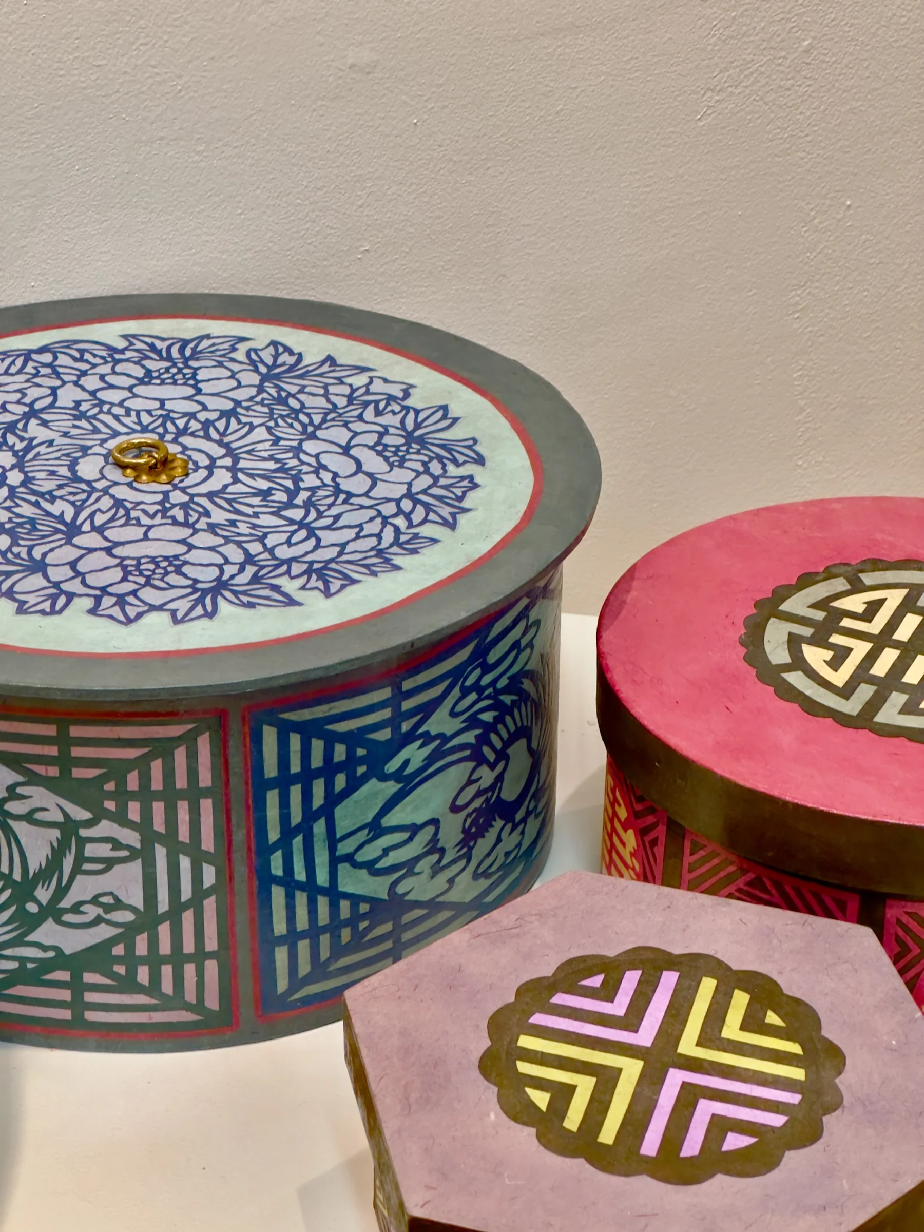 Colorful Hanji-covered and ceramic boxes by CASA artist Lucky Kim