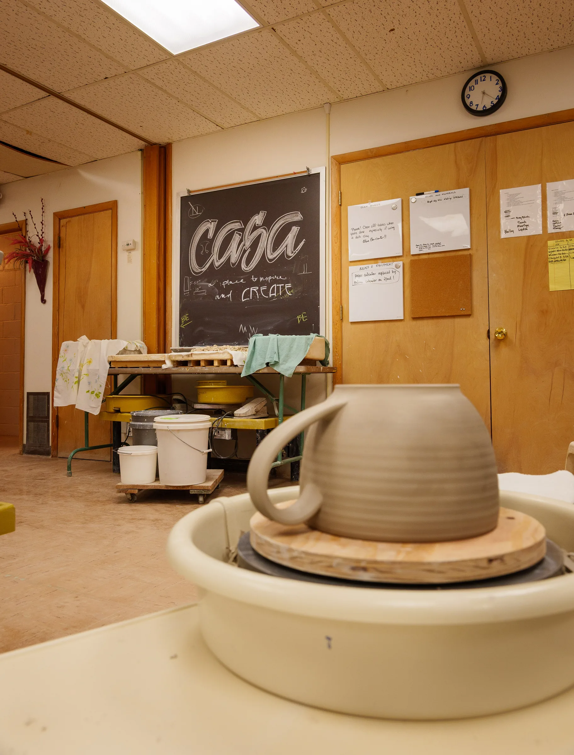 View of the clay studios at CASA with work at the wheel in progress